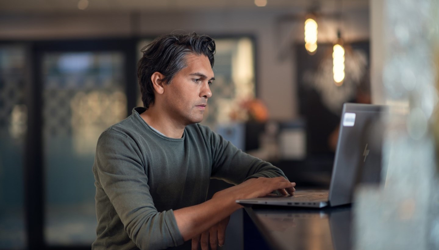 Man behind laptop